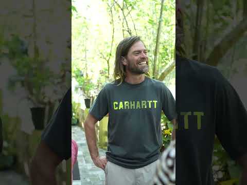 A guest smiling in the Jungle Bird garden